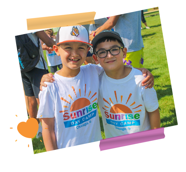 2 sunrise campers with arms around each other